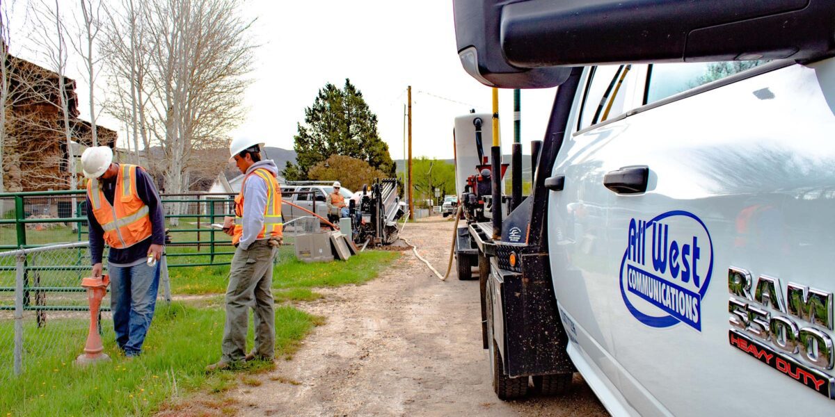 All West workers at a construction project beside a road