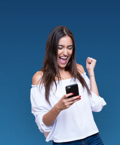 Woman holding a cell phone and laughing