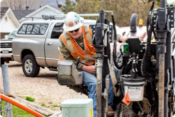 man drilling ground