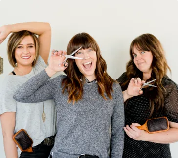 Three women with scissors