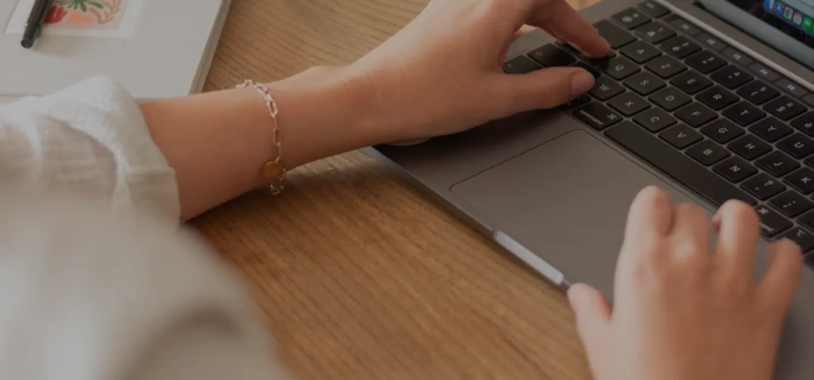 Woman typing on laptop