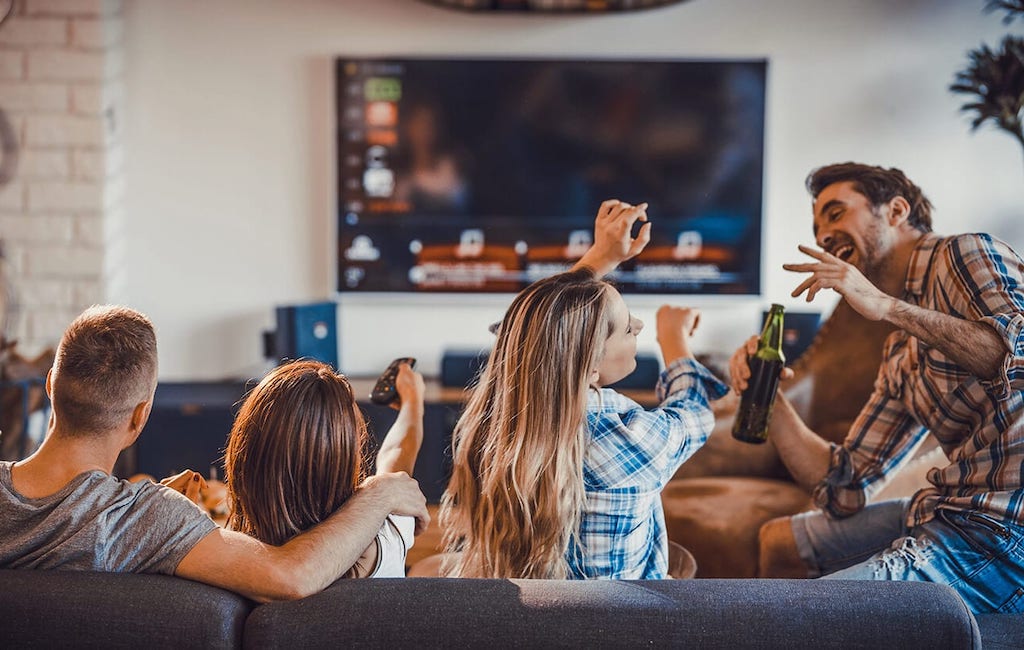 group watching TV