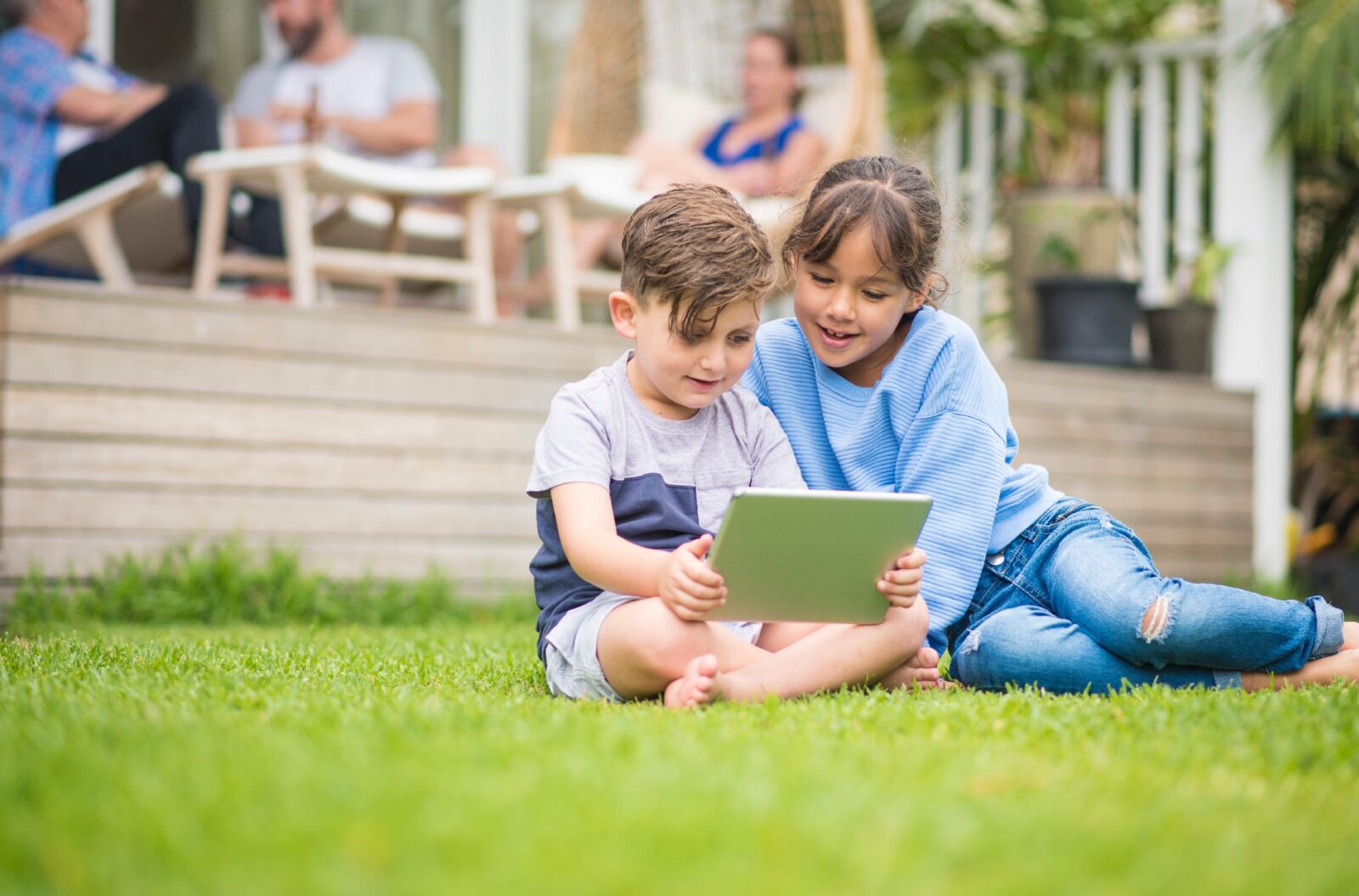 children playing on a mobile device