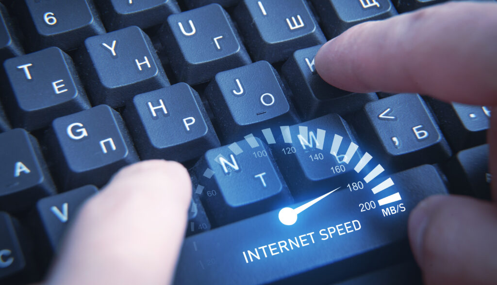 This visual creatively merges the physical act of typing with a digital representation of internet speed, illustrating the dynamics of upload and download speed differences.