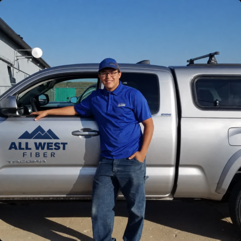 Tech on-site with work vehicle